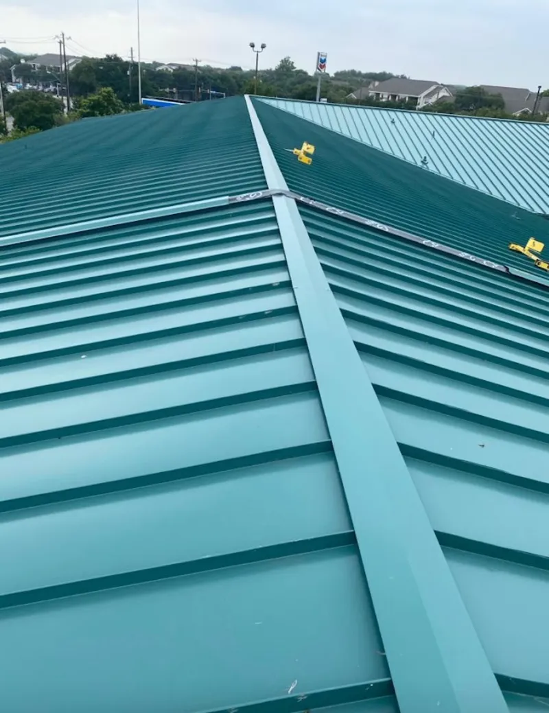 Green commercial metal roof ridge and valley for Metal Roof Repair in Andover